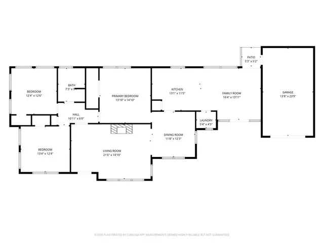 a backyard of a house with outdoor seating