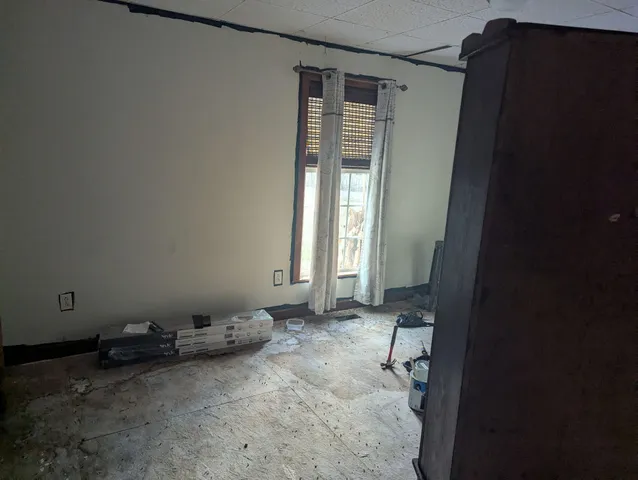 an empty room with windows