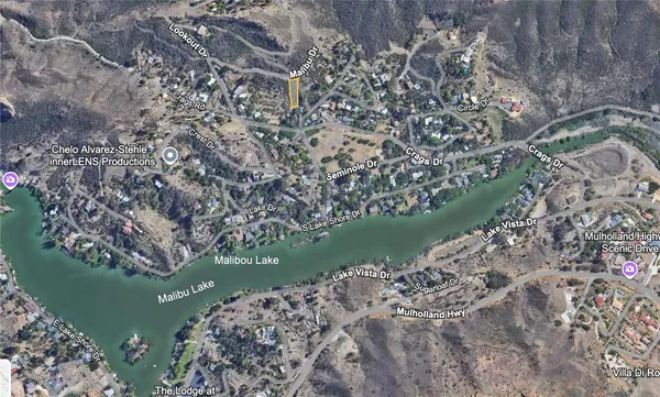 a view of lake with green space