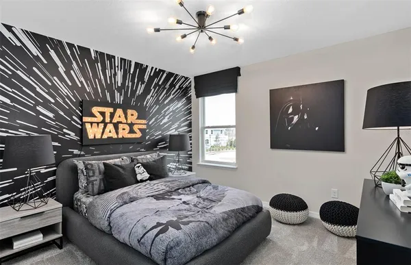 a bedroom with a bed and a mirror