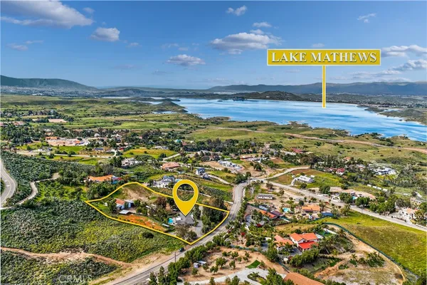 a view of a street with an ocean view