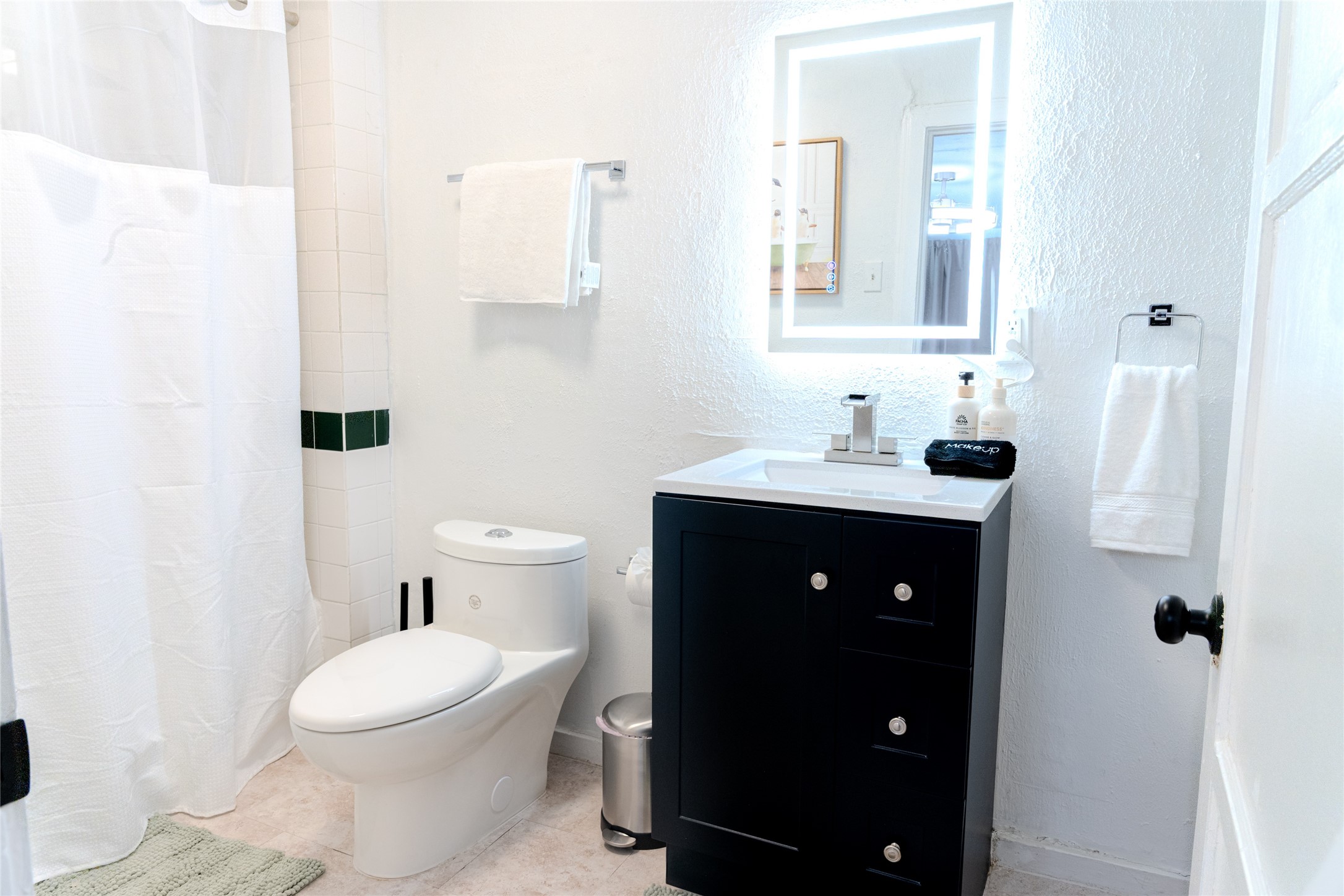 2016 Dunlavy Street, Unit 3 Houston, TX 77006 - Photo 18 of 22 a bathroom with a sink vanity and a toilet
