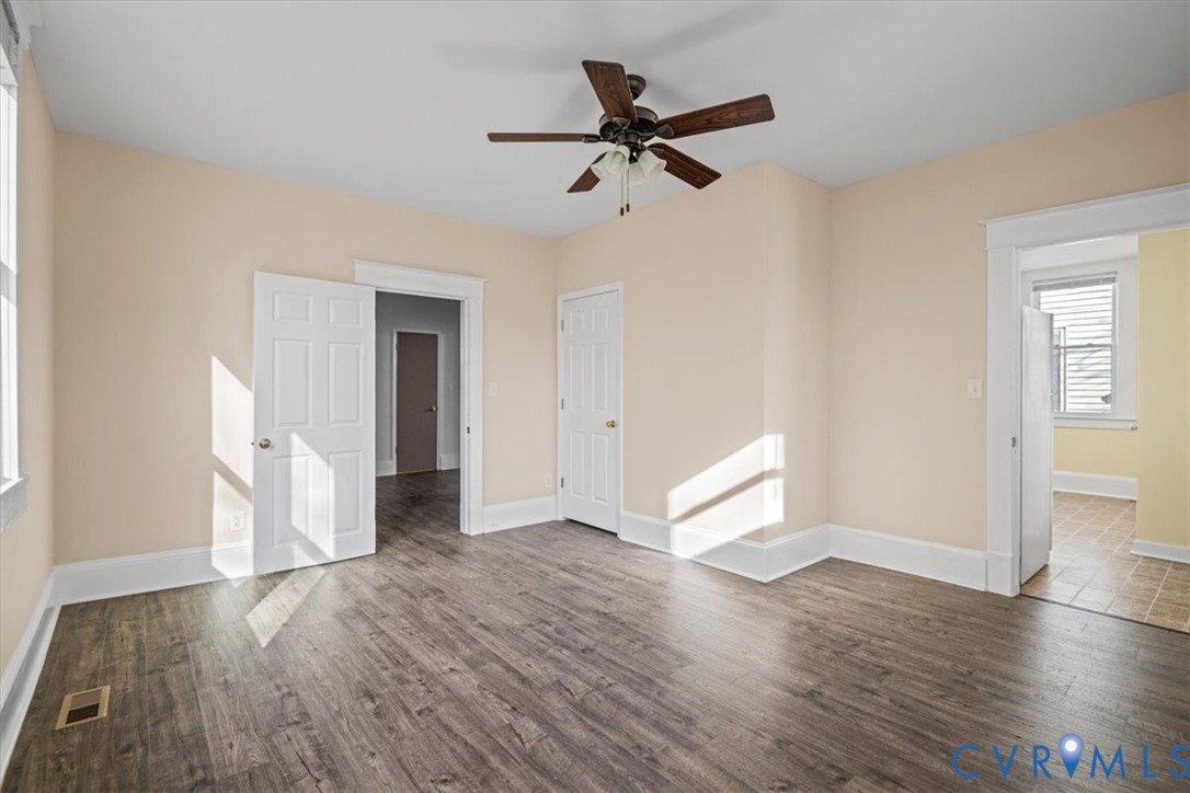 235 Lafayette Avenue Colonial Heights, VA 23834 - Photo 14 of 31 wooden floor in an empty room with a window