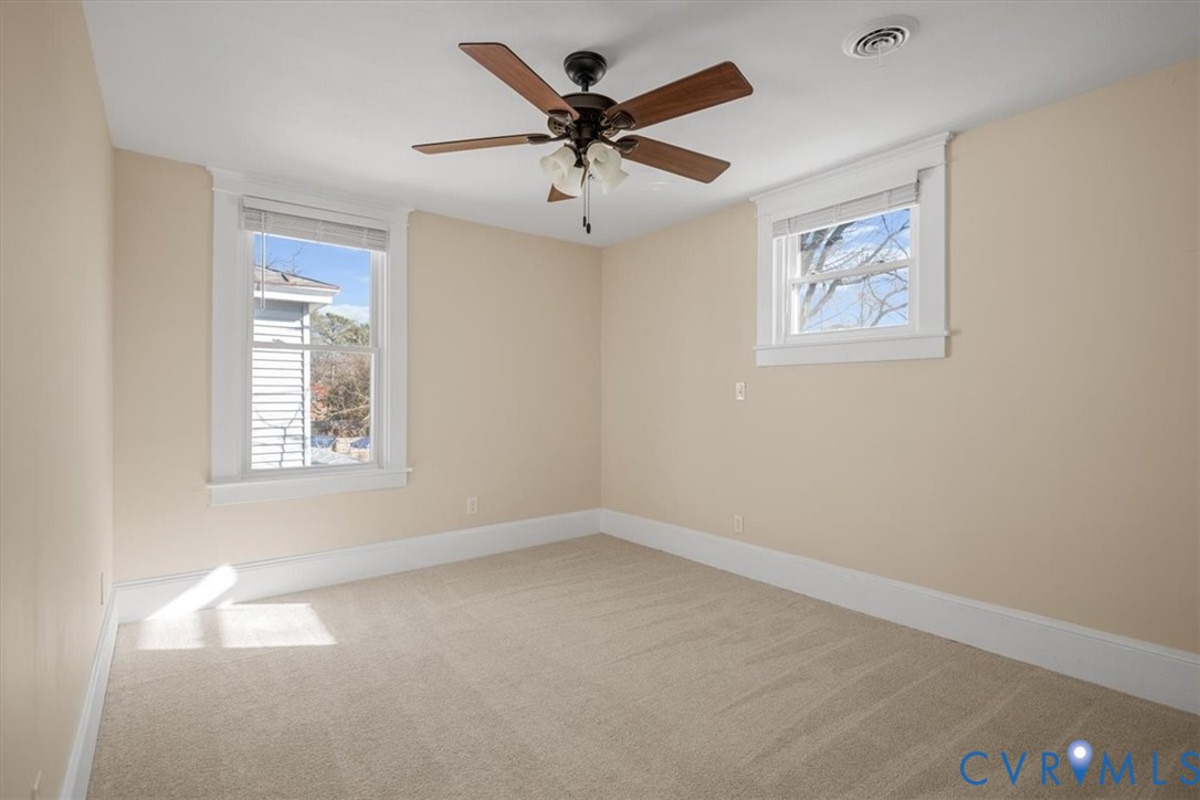 235 Lafayette Avenue Colonial Heights, VA 23834 - Photo 25 of 31 an empty room with a window and a ceiling fan