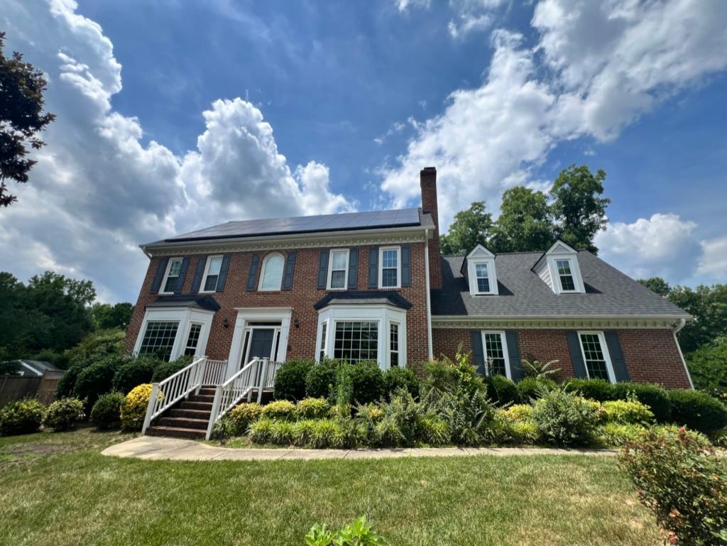 front view of a house with a yard