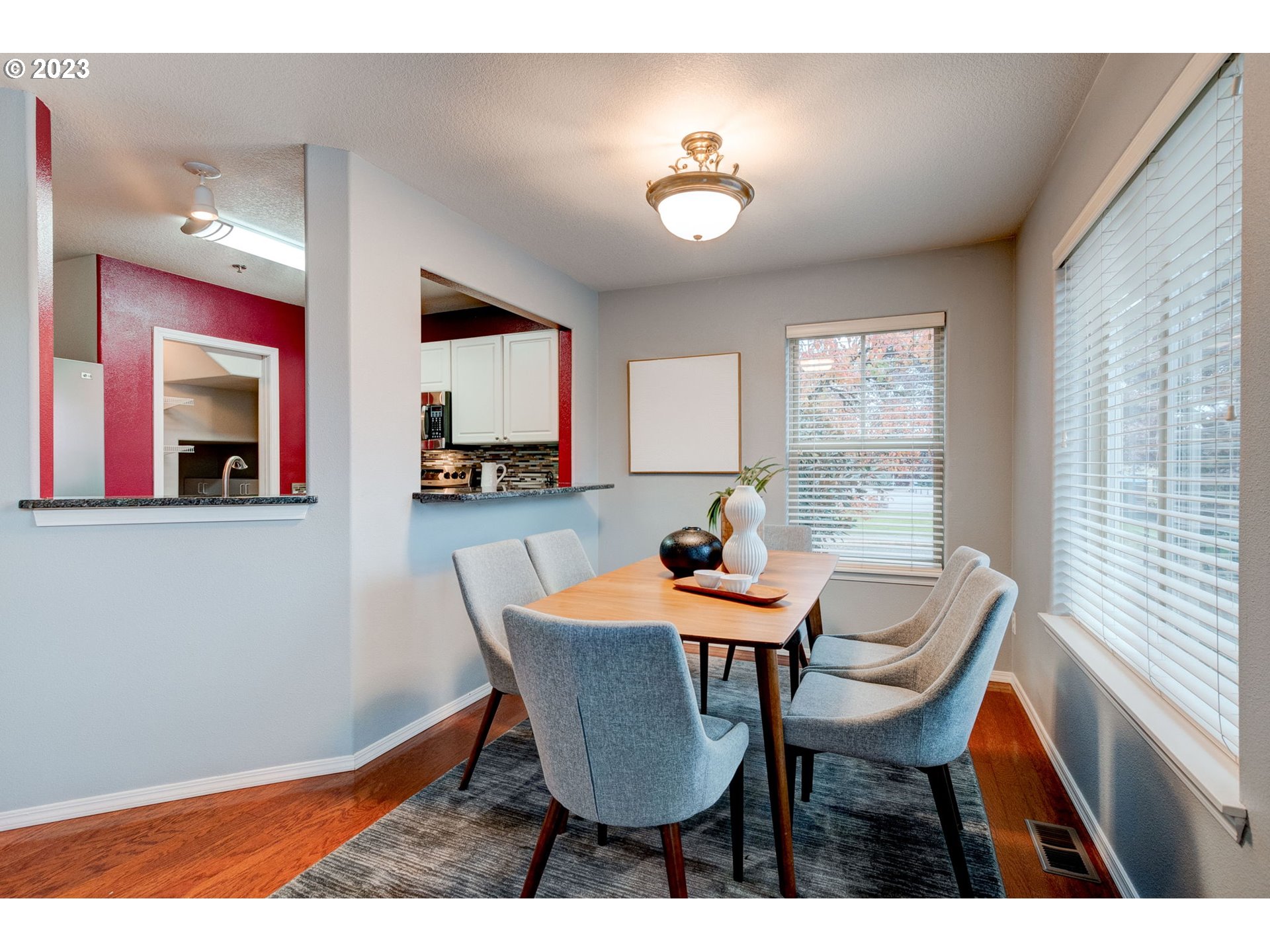 8255 Southwest Seneca Street Tualatin, OR 97062 - Photo 18 of 41 a view of a dining room with furniture and window