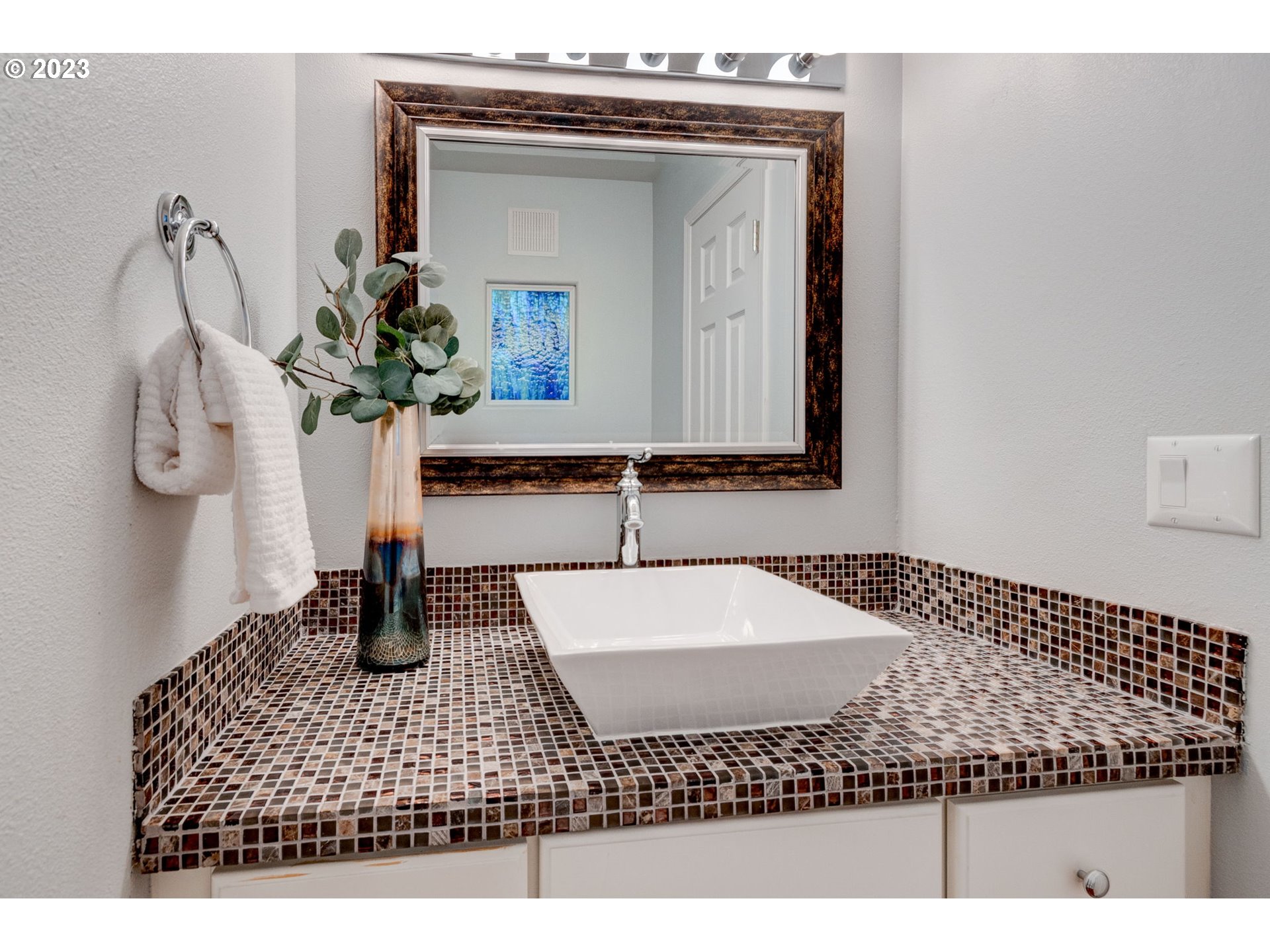 8255 Southwest Seneca Street Tualatin, OR 97062 - Photo 21 of 41 a bathroom with a sink and a mirror