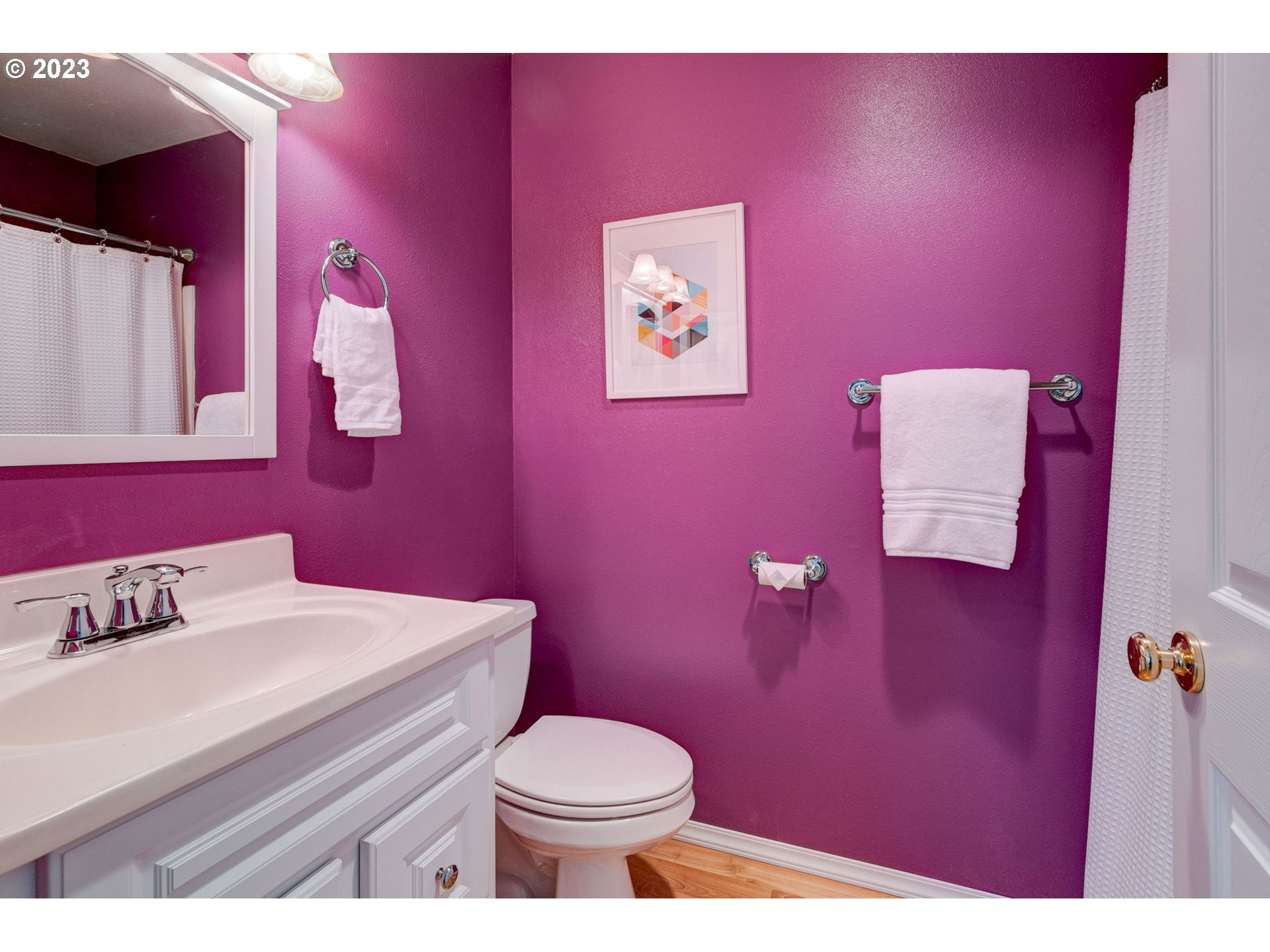 8255 Southwest Seneca Street Tualatin, OR 97062 - Photo 25 of 41 a bathroom with a sink a toilet and mirror