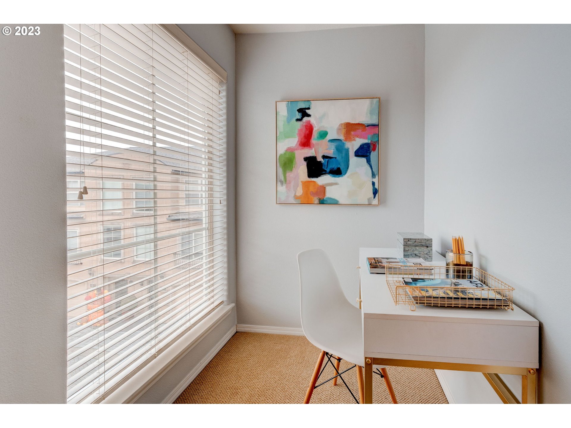 8255 Southwest Seneca Street Tualatin, OR 97062 - Photo 27 of 41 a view of a workspace with furniture and a window