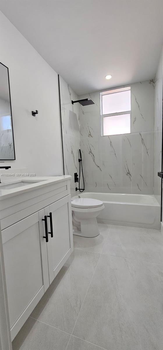 2425 Southwest 6th Street, Unit 4 Miami, FL 33135 - Photo 12 of 14 a bathroom with a bathtub and a sink