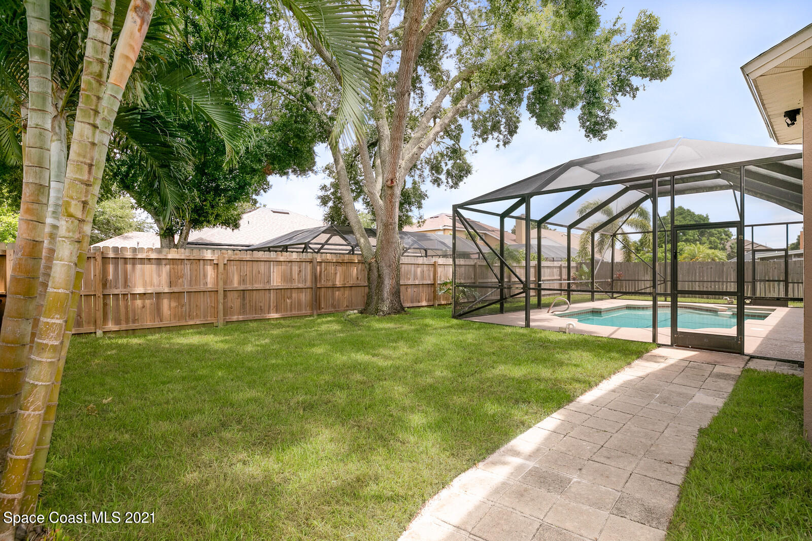 4805 Springwater Circle Melbourne, FL 32940 - Photo 34 of 36 Yard and screened pool