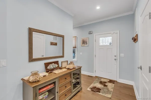 a kitchen with stainless steel appliances granite countertop a stove and a refrigerator
