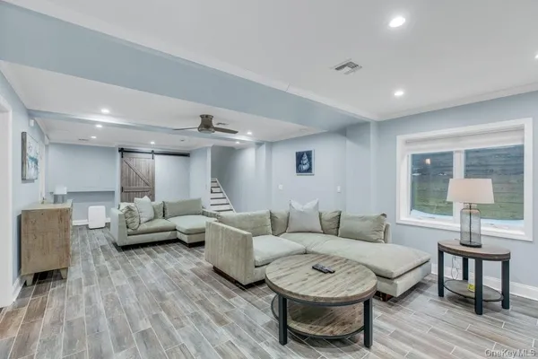 a living room with furniture and a table