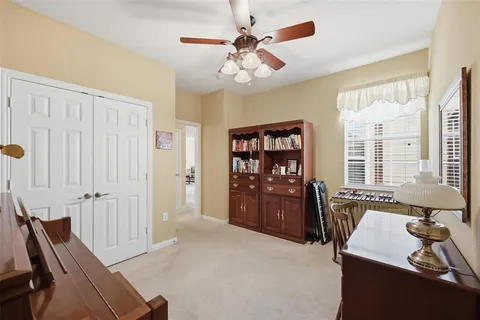 a room with furniture and chandelier