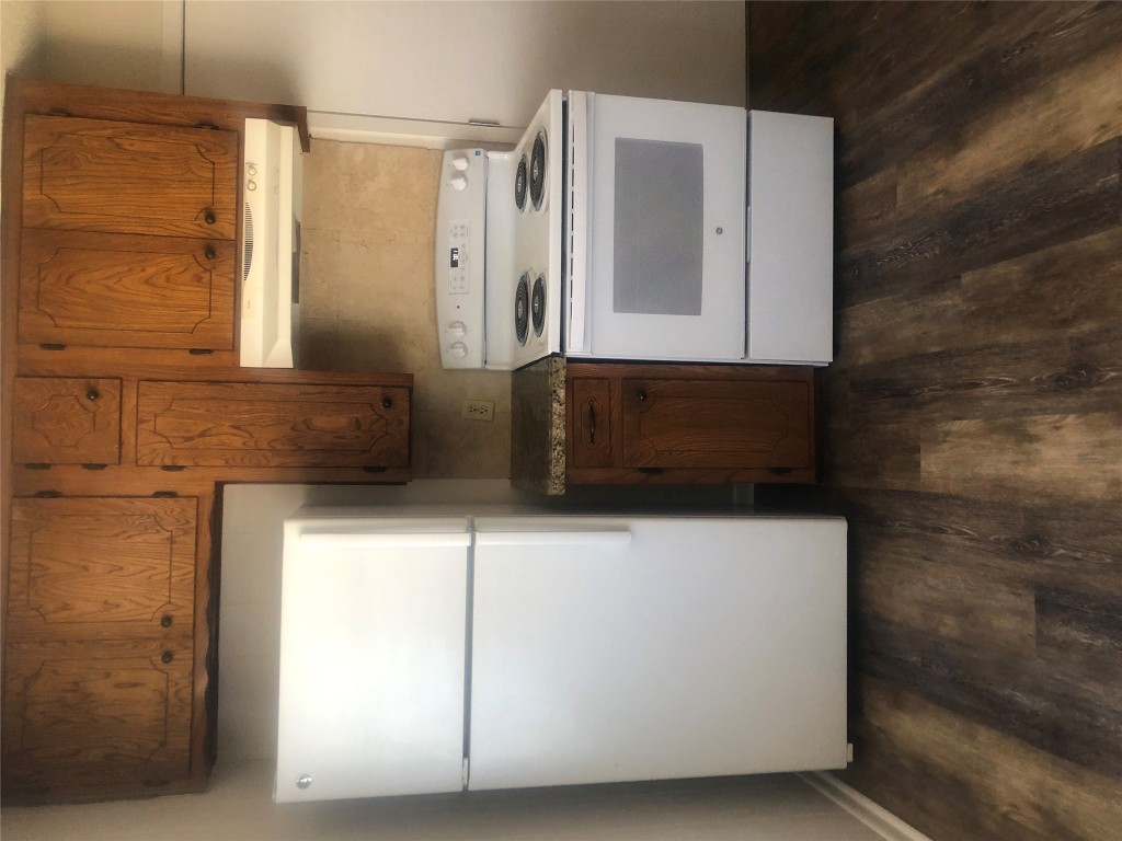 610 Cheyenne Drive Temple, TX 76504 - Photo 5 of 7 a kitchen with a stove top oven and cabinets