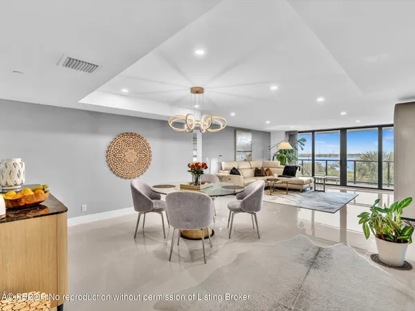 a living room with furniture and a table