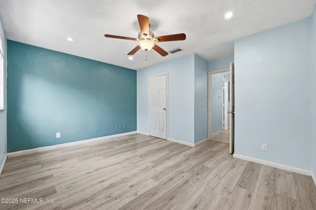 a view of swimming pool with outdoor seating