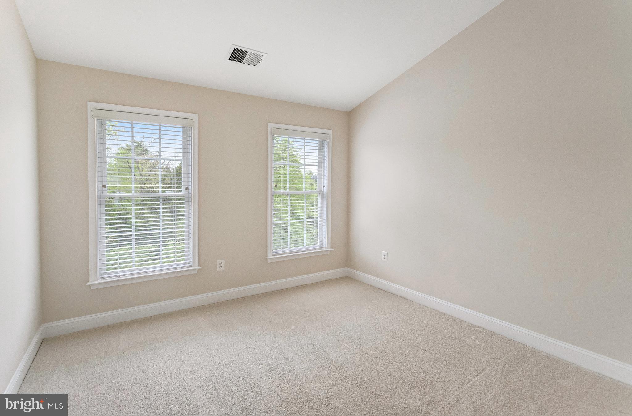 25804 Commons Square Chantilly, VA 20152 - Photo 25 of 48 a view of an empty room with a window