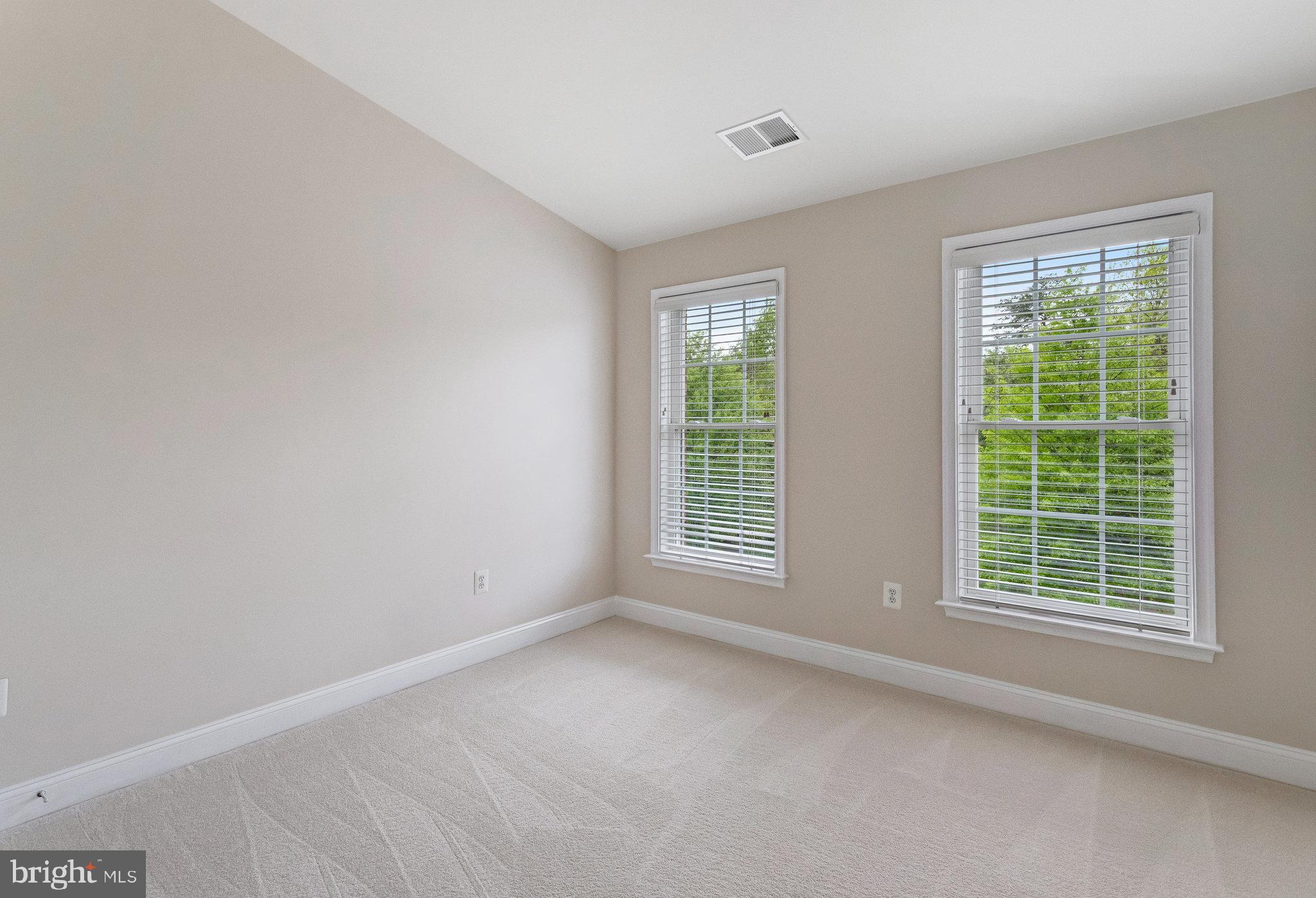 25804 Commons Square Chantilly, VA 20152 - Photo 27 of 48 an empty room with a window