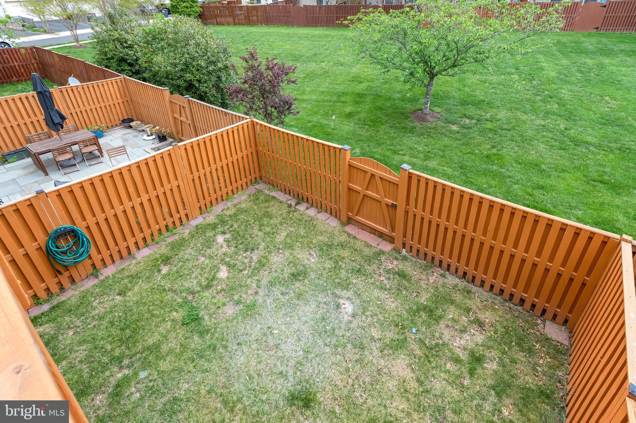 25804 Commons Square Chantilly, VA 20152 - Photo 39 of 48 a view of outdoor space with deck and backyard