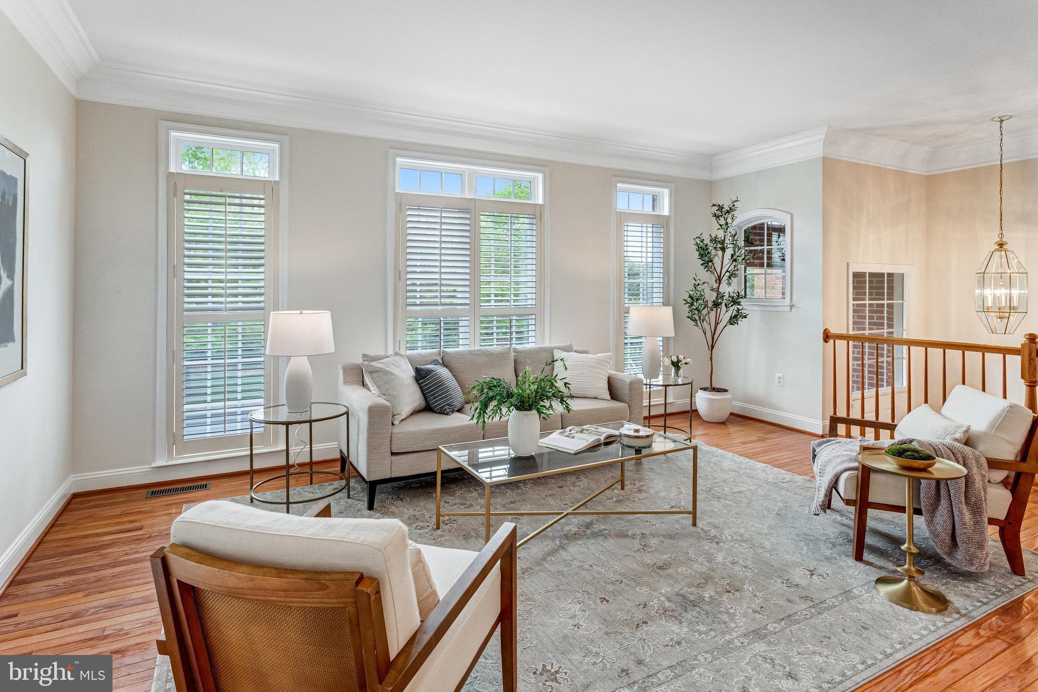 25804 Commons Square Chantilly, VA 20152 - Photo 5 of 48 a living room with furniture and wooden floor