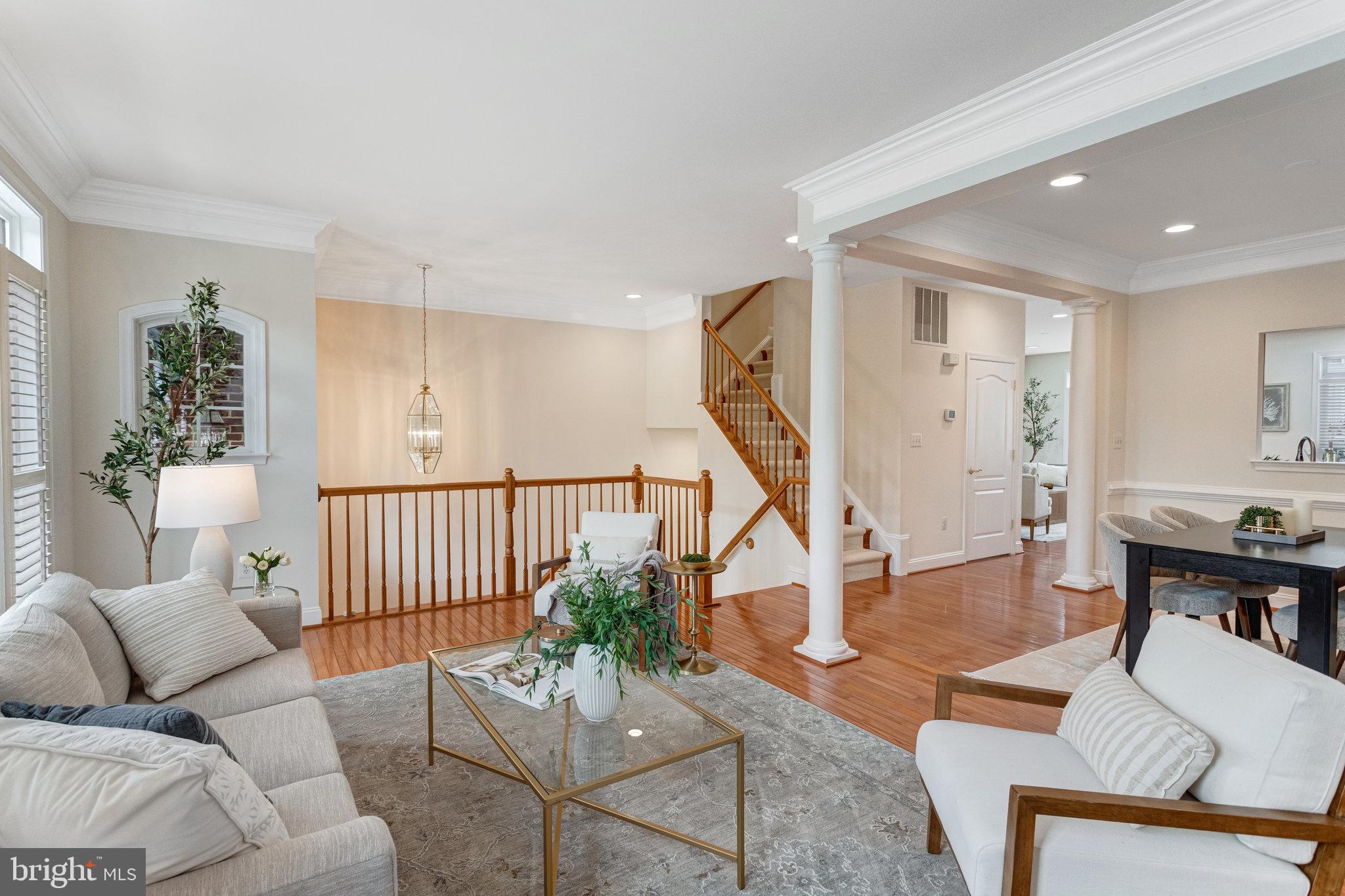 25804 Commons Square Chantilly, VA 20152 - Photo 6 of 48 a living room with furniture and wooden floor