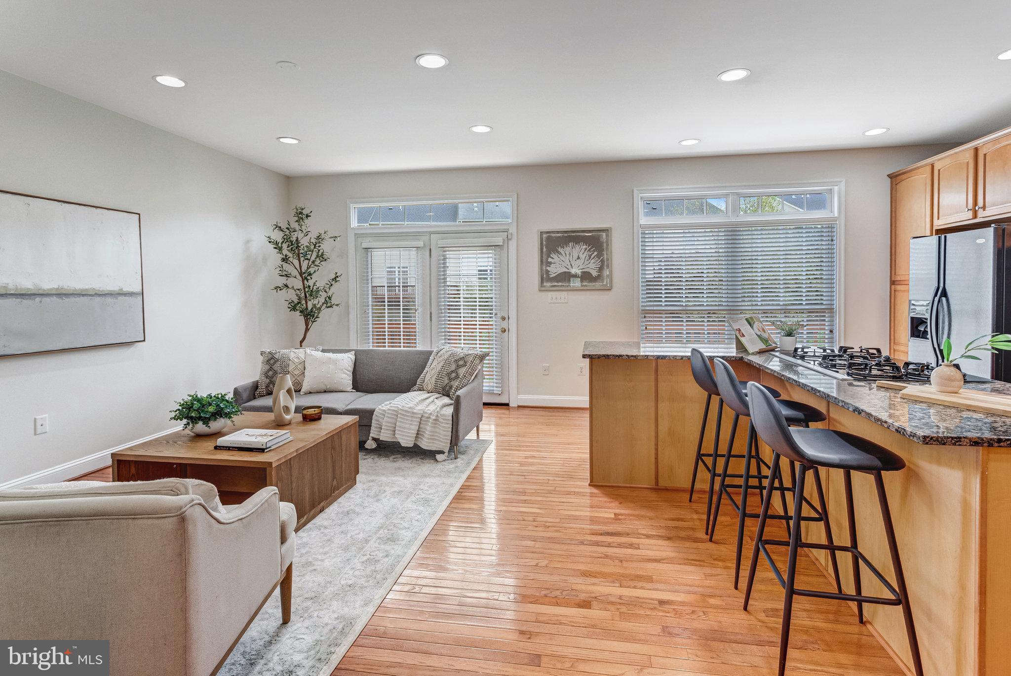 25804 Commons Square Chantilly, VA 20152 - Photo 10 of 48 a living room with furniture and a large window