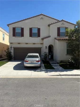 a car parked in front of a house