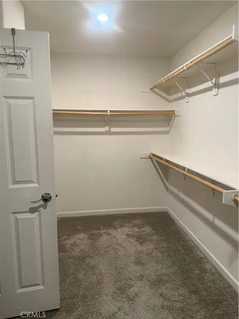 a view of a room with racks on the wall
