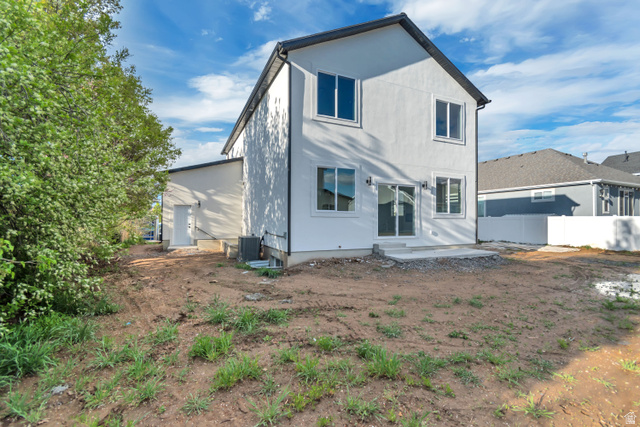 2535 West Santa Fe Drive Mapleton, UT 84664 - Photo 24 of 26 Rear view of house with a patio area and stucco siding