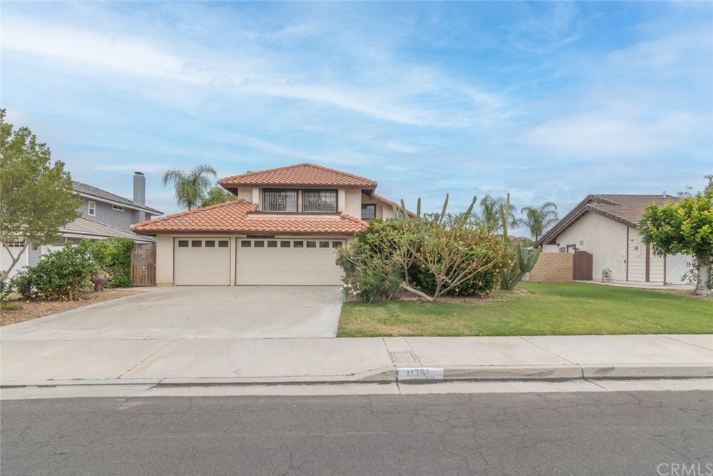 11351 Rancho Del Oro Drive Riverside, CA 92505 - Photo 1 of 1 front view of a house with a yard