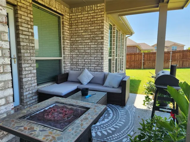 a view of a balcony with couch