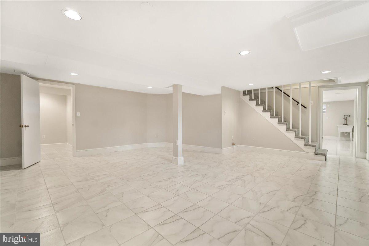 9522 Crosby Road Silver Spring, MD 20910 - Photo 23 of 39 Rec room showing doorway that leads to storage