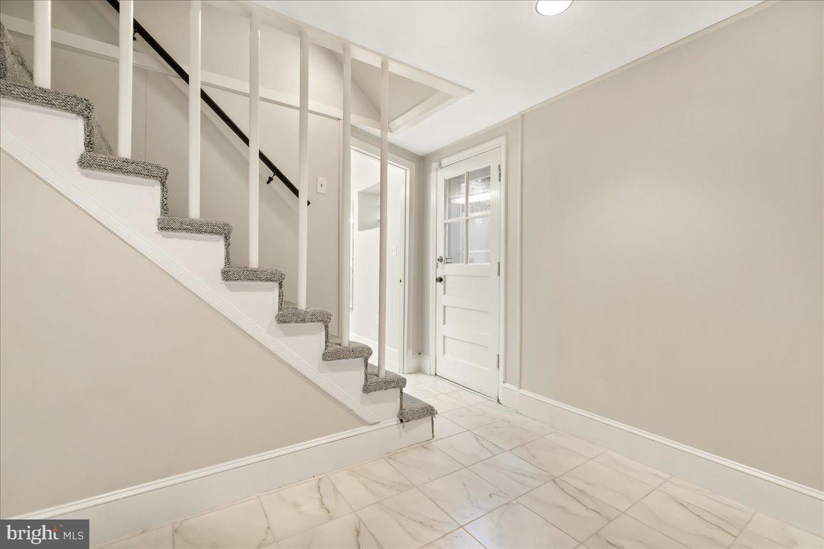 9522 Crosby Road Silver Spring, MD 20910 - Photo 25 of 39 Basement exterior door to walk-up stairs