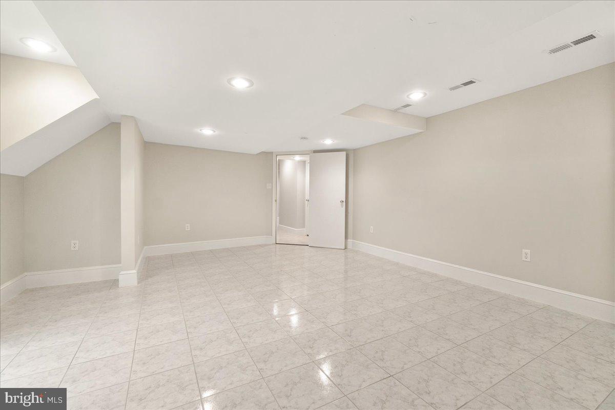 9522 Crosby Road Silver Spring, MD 20910 - Photo 28 of 39 Bonus room doorway leading to hallway and bathroom