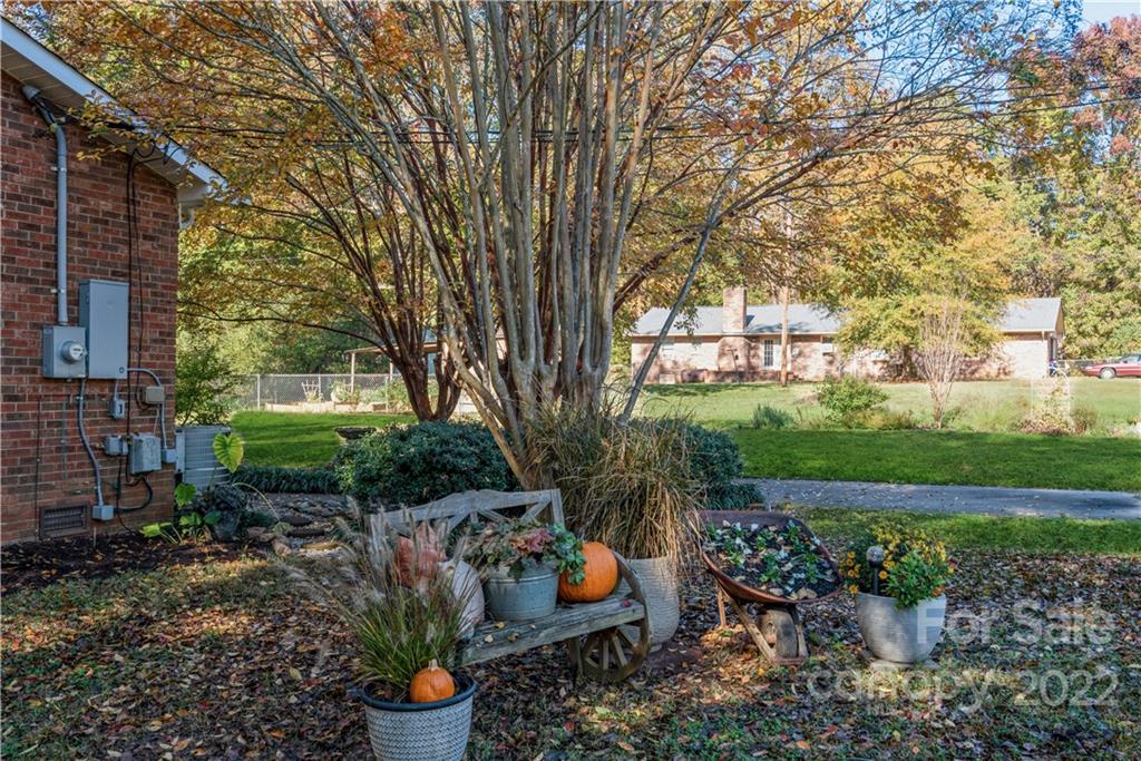 1152 Faulkner Road, Unit 1 Clover, SC 29710 - Photo 4 of 26 a backyard of a house with lots of green space