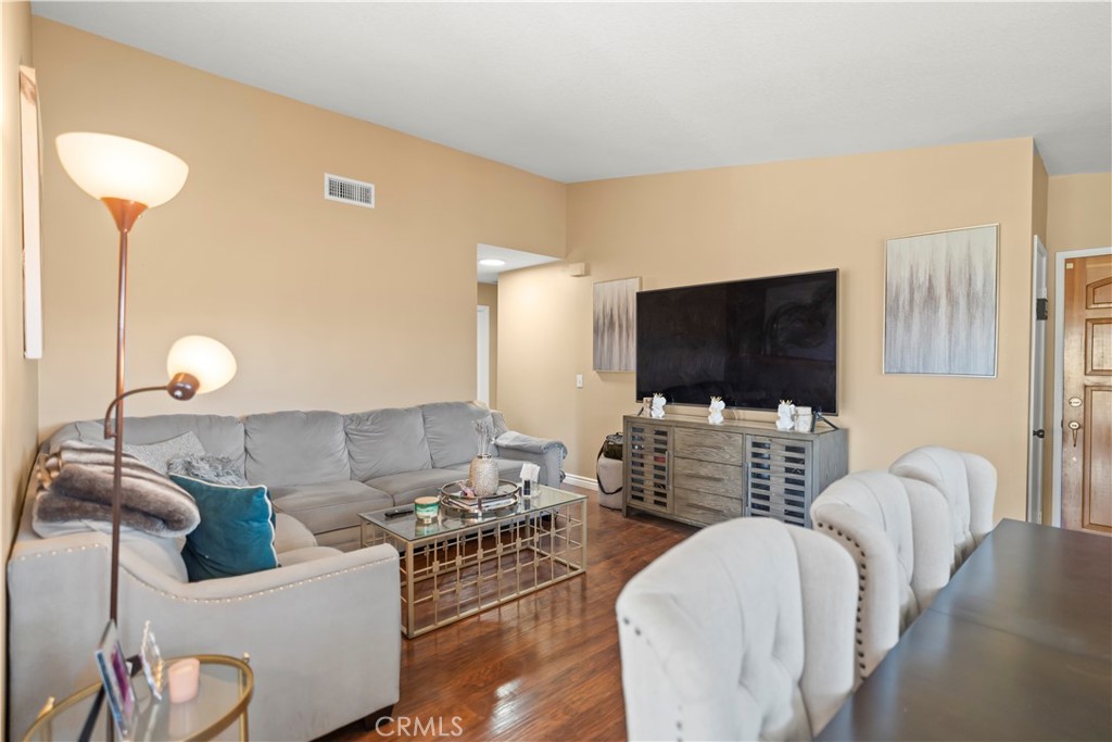 27829 Carnegie Avenue Santa Clarita, CA 91350 - Photo 15 of 46 a living room with furniture and a flat screen tv