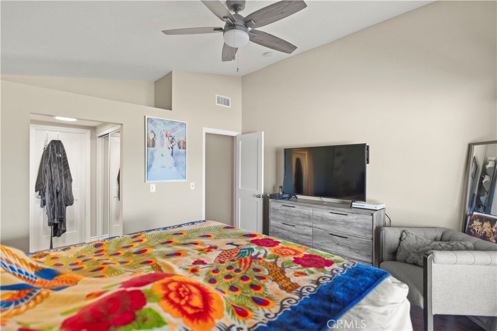 27829 Carnegie Avenue Santa Clarita, CA 91350 - Photo 22 of 46 a bedroom with a bed and a flat screen tv