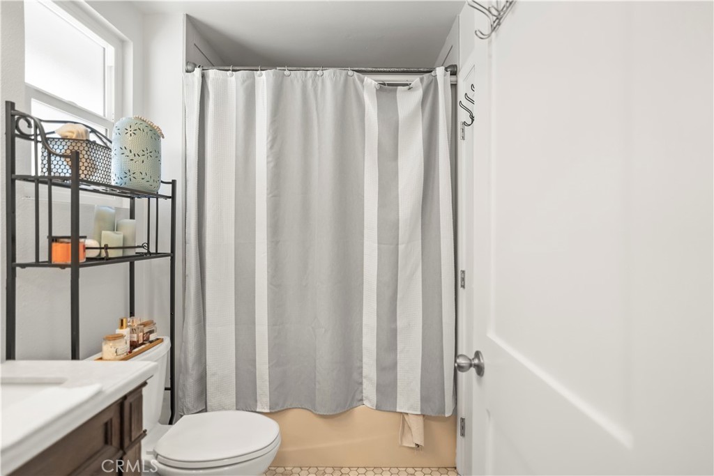 27829 Carnegie Avenue Santa Clarita, CA 91350 - Photo 24 of 46 a bathroom with a sink toilet and shower