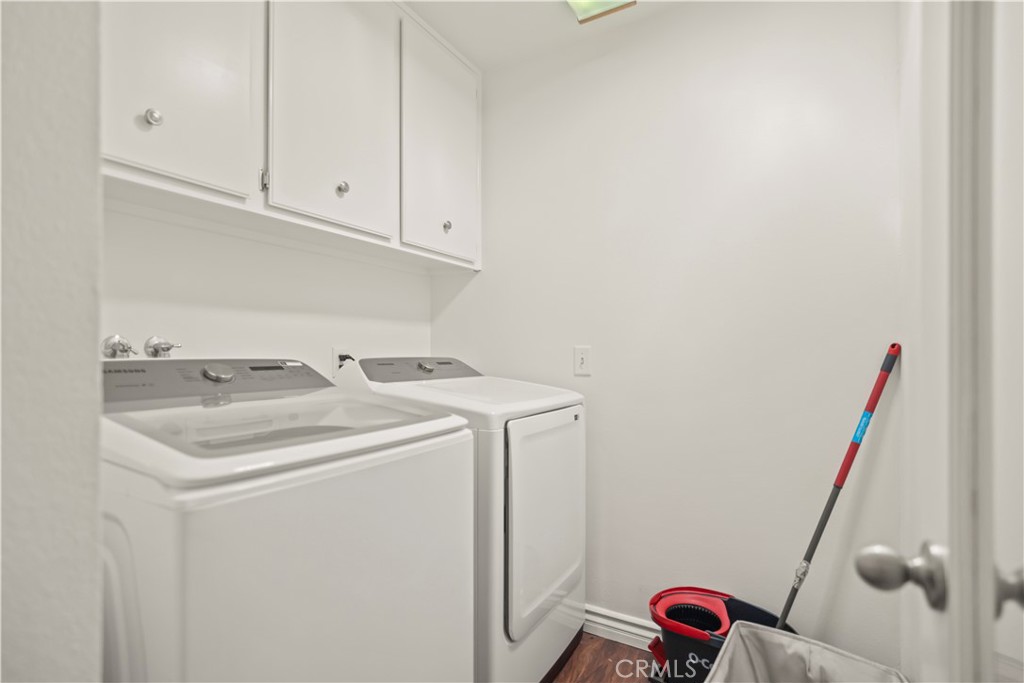 27829 Carnegie Avenue Santa Clarita, CA 91350 - Photo 26 of 46 a utility room with dryer and washer