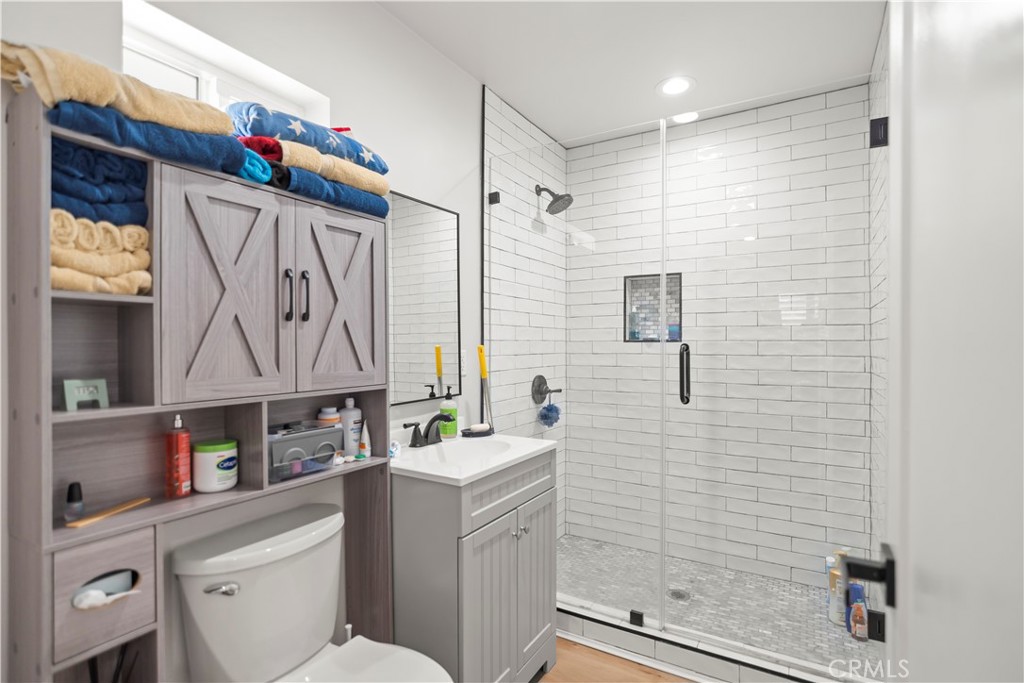 27829 Carnegie Avenue Santa Clarita, CA 91350 - Photo 34 of 46 a bathroom with a sink a toilet and shower