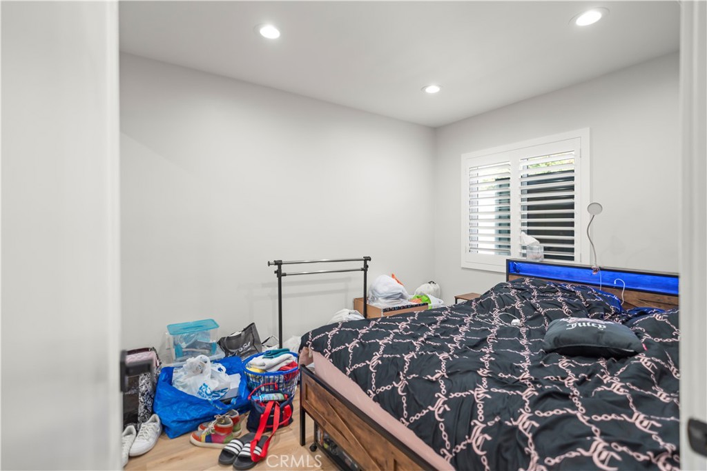 27829 Carnegie Avenue Santa Clarita, CA 91350 - Photo 36 of 46 a bed sitting in a bedroom next to a window