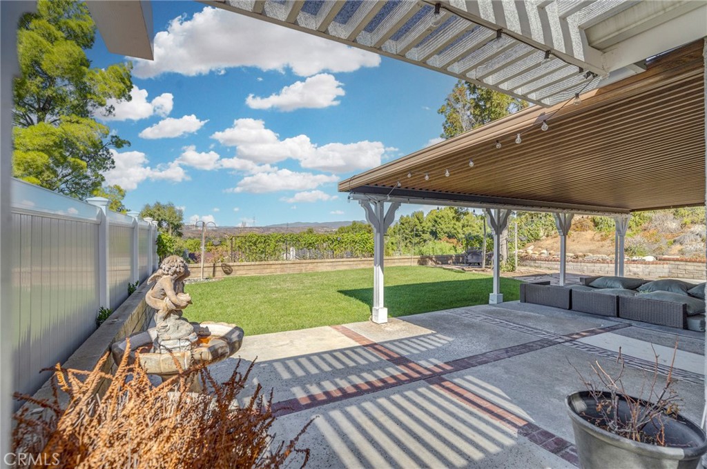 27829 Carnegie Avenue Santa Clarita, CA 91350 - Photo 39 of 46 a view of a backyard with sitting area