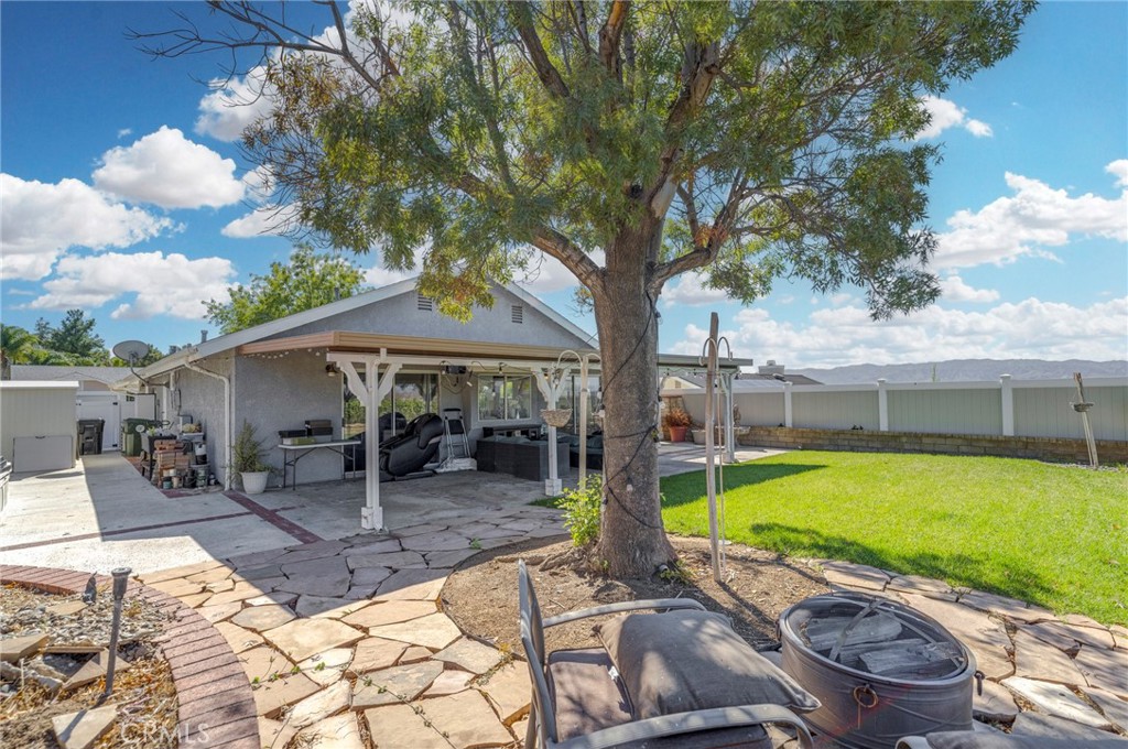 27829 Carnegie Avenue Santa Clarita, CA 91350 - Photo 43 of 46 a view of a swimming pool with a patio