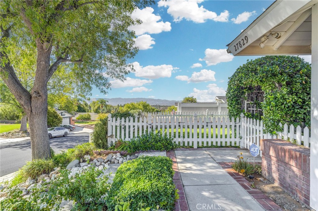 27829 Carnegie Avenue Santa Clarita, CA 91350 - Photo 5 of 46 a view of a pathway with a garden