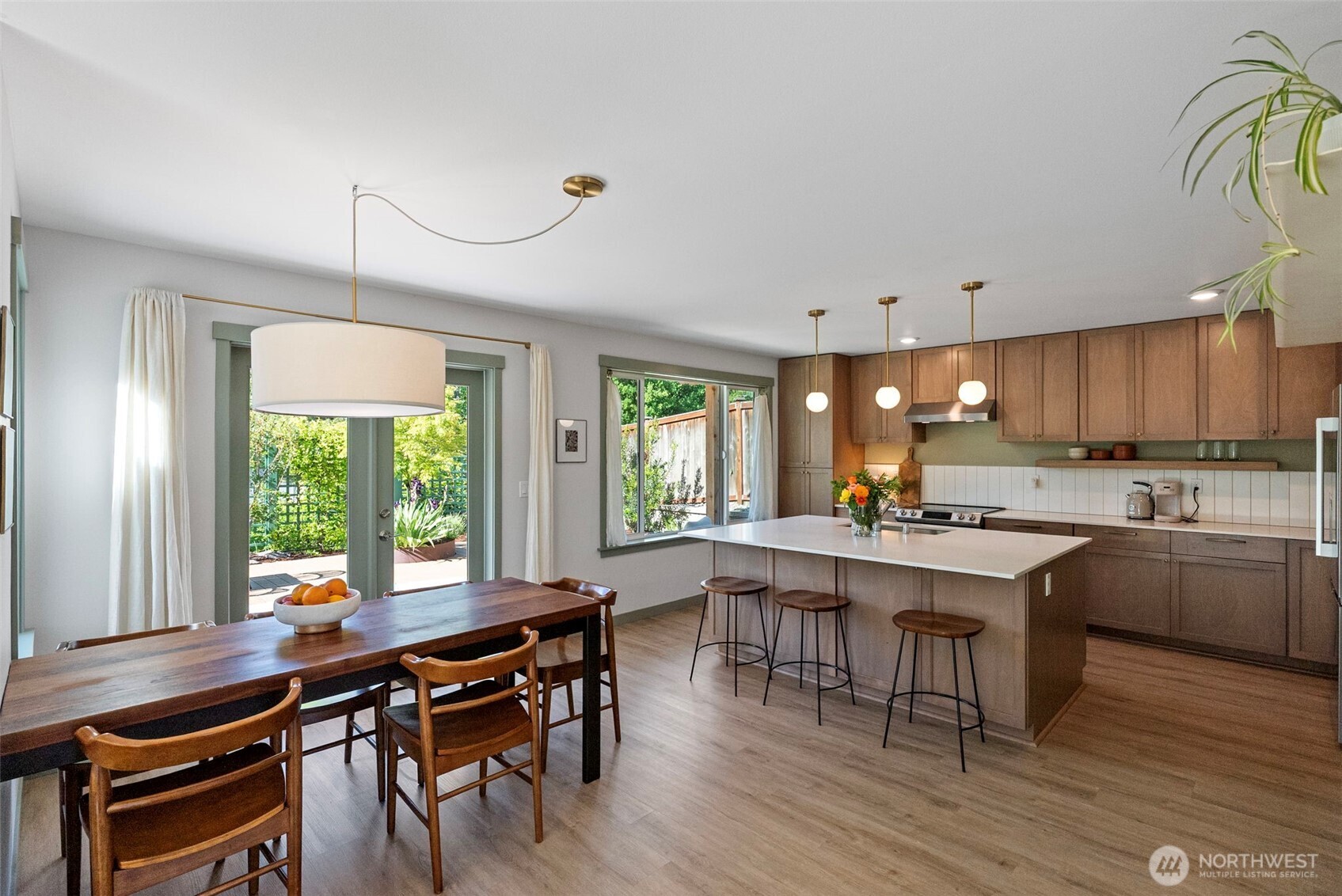 503 5th Street Steilacoom, WA 98388 - Photo 10 of 40 a kitchen with a table and chairs in it