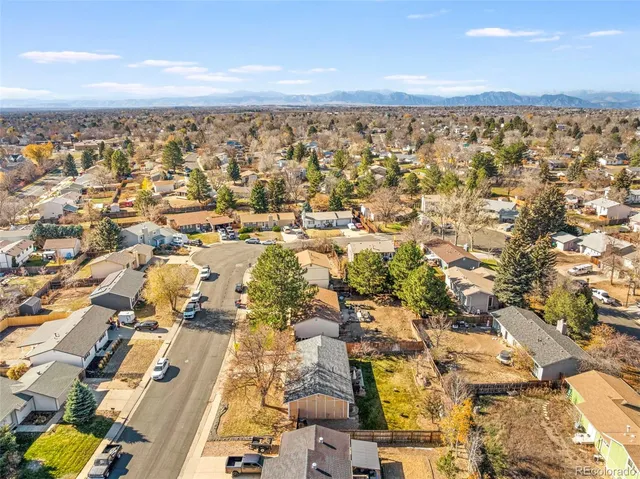 an aerial view of residential building with parking space
