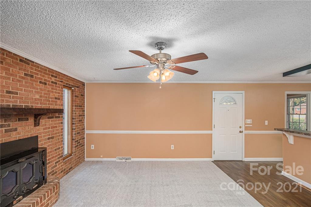 1655 Songwood Road Concord, NC 28025 - Photo 4 of 21 a view of an empty room with a window