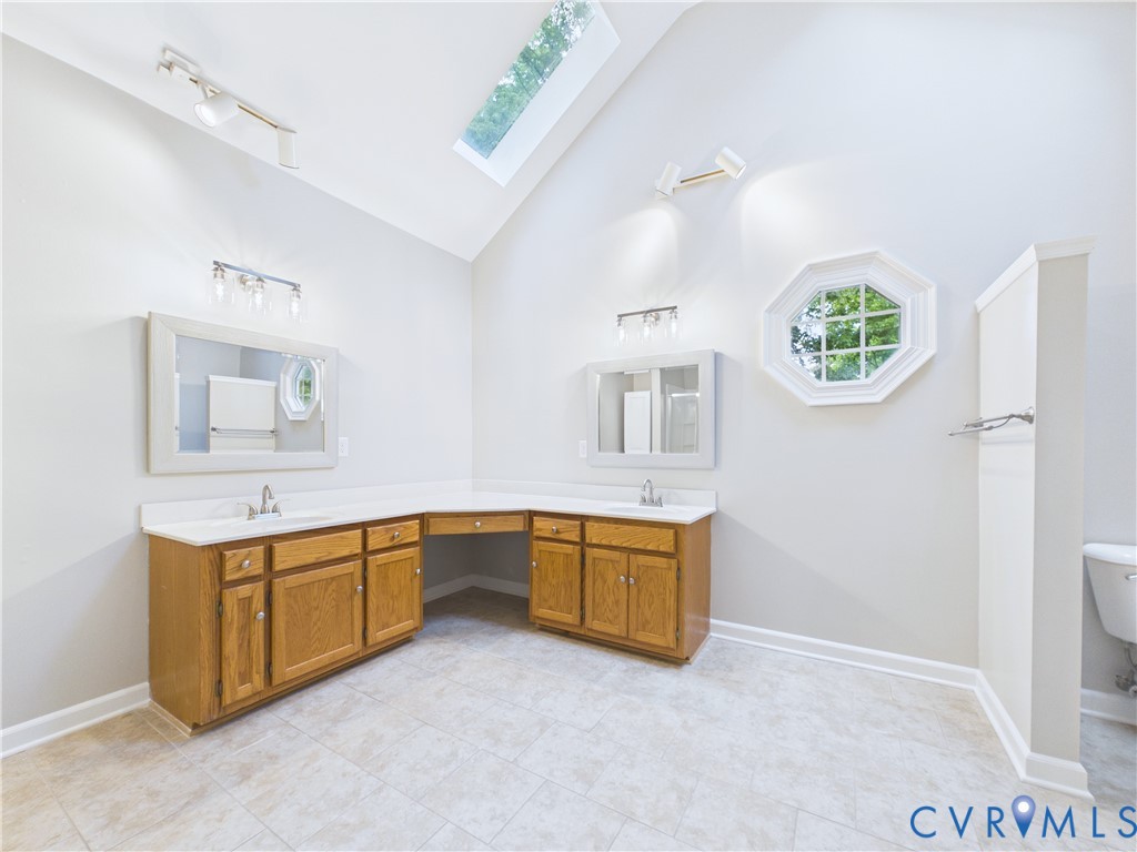 4502 Greyfield Place Chester, VA 23831 - Photo 33 of 40 a view of a kitchen with sink cabinets and entryway