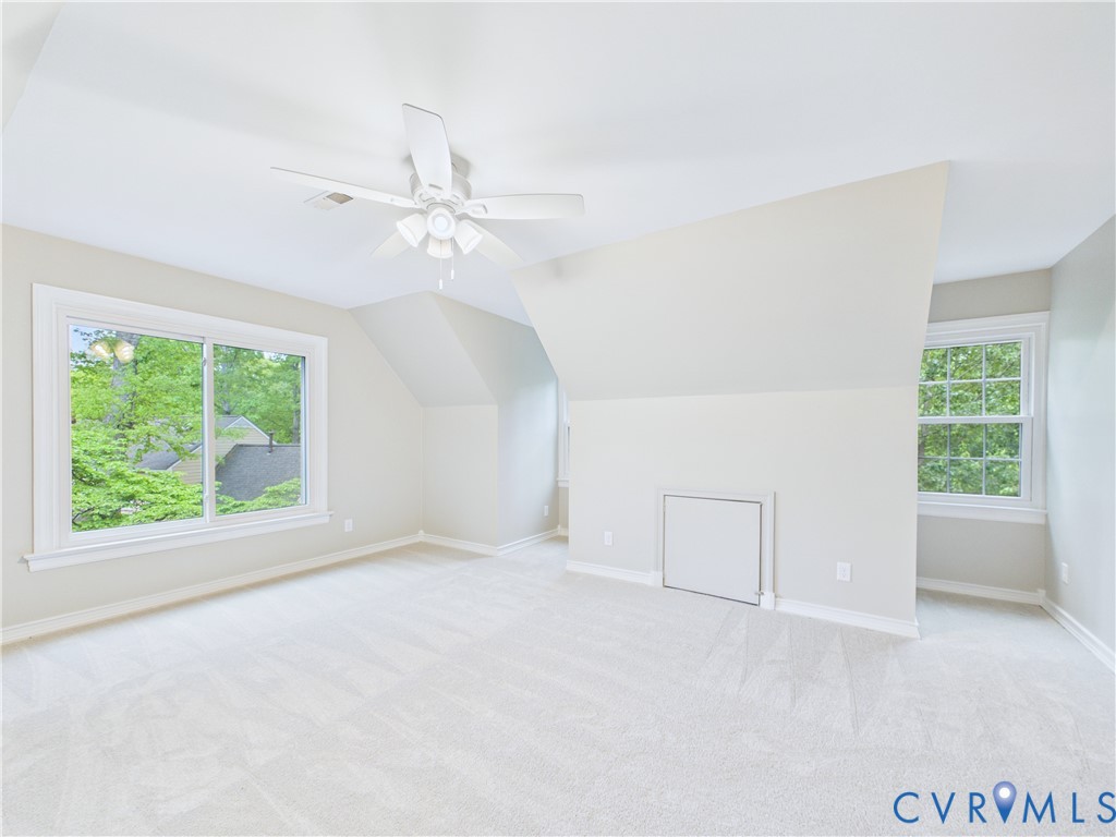 4502 Greyfield Place Chester, VA 23831 - Photo 35 of 40 an empty room with windows and ceiling fan